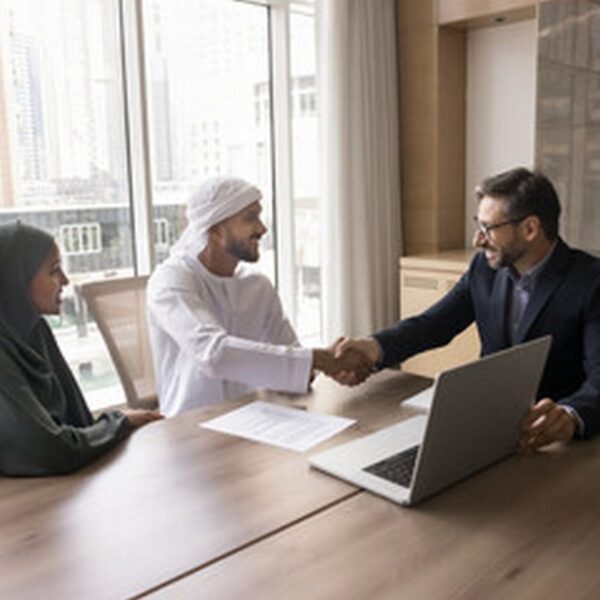 man-shaking-hands-with-woman-background